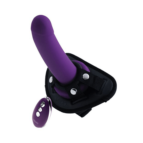 Strapped vibrating strap-on kit in purple